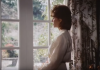Pam at window.png