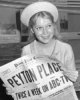 1964-with-newspaper280.jpg